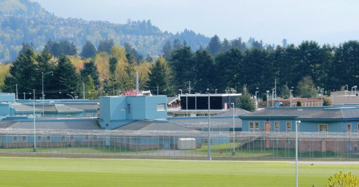 A prison is seen near pine trees - federal administrative segregation class action - solitary confinement - Canadian federal penitentiary