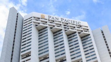Looking up at the building of the Pan Pacific Hotel, Raffles Boulevard, Singapore.