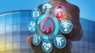 Unrecognizable male cybersecurity manager spotting a hacking attack on health care data.