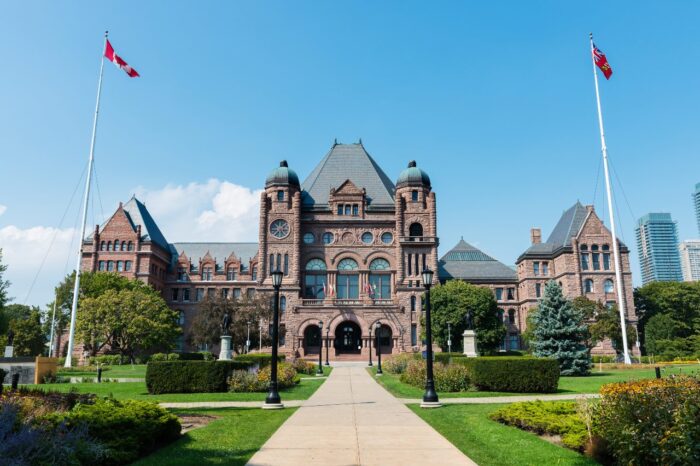 Legislative Assembly of Ontario at Queens Park on a clear Summer day - youth justice facilities ontario