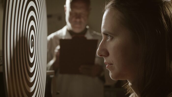 Scientist doing hypnosis experiments in the vintage style lab.