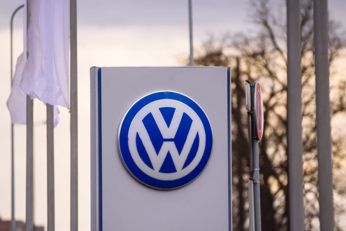 Volkswagen company logo near automobile centre.