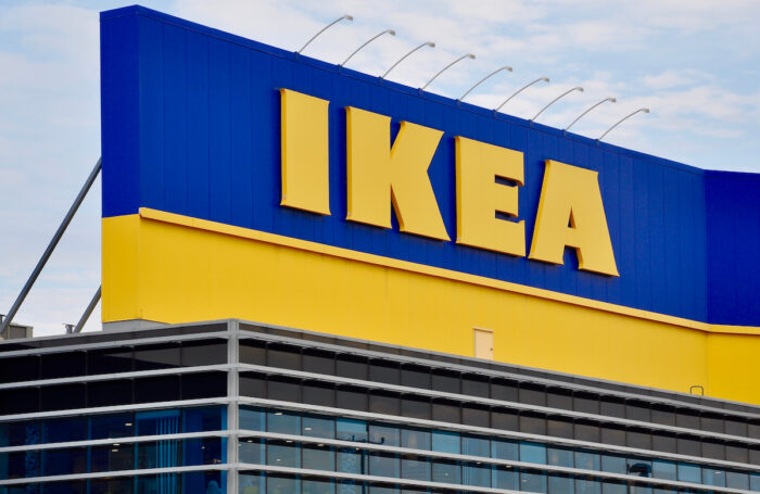 Sign of Ikea in front of the store.