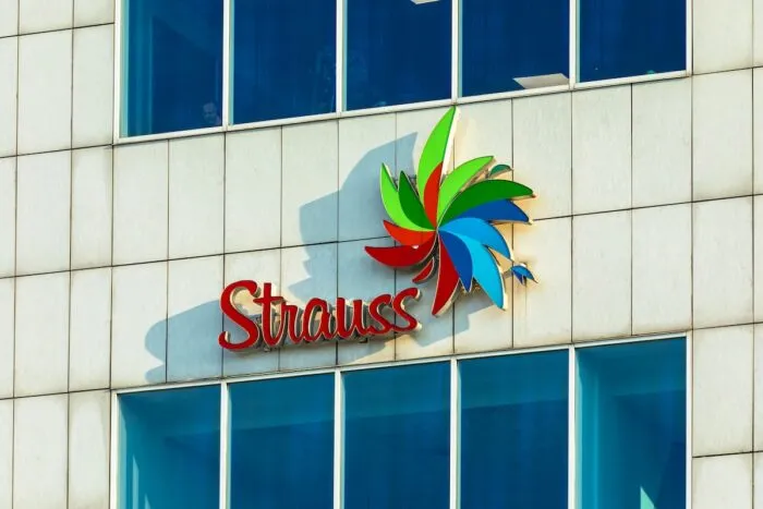 Strauss Group company logo on building.