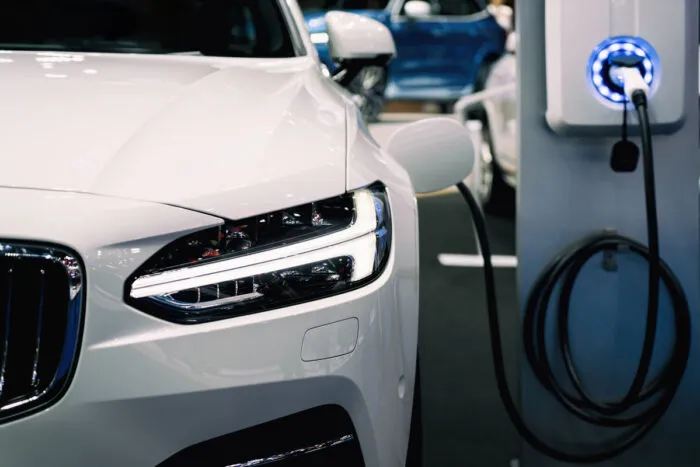 Power supply for hybrid electric car charging battery. Eco car concept.