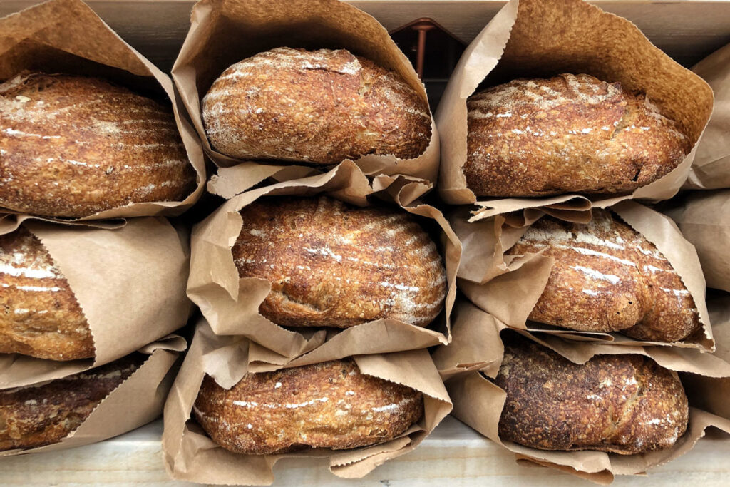 Close up of fresh baked bread, representing the Canada Bread Co. price-fixing fine.