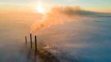 Smoke migrating from a power plant, representing the Canada methane regulations.