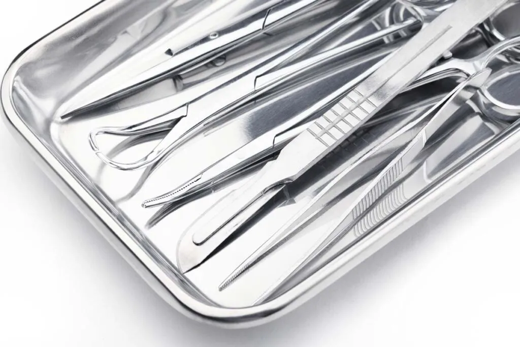 Close up of medical instruments in a steel tray, representing the Paramed settlement.