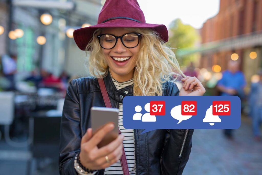 A woman smiling at her phone with a Facebook notifications overlay, representing the Facebook Sponsored Stories settlement.