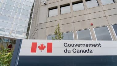 Gouvernement du Canada (Government of Canada) sign outside the office building in Ottawa, Ontario, Canada