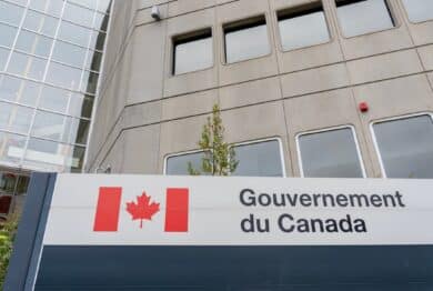 Gouvernement du Canada (Government of Canada) sign outside the office building in Ottawa, Ontario, Canada