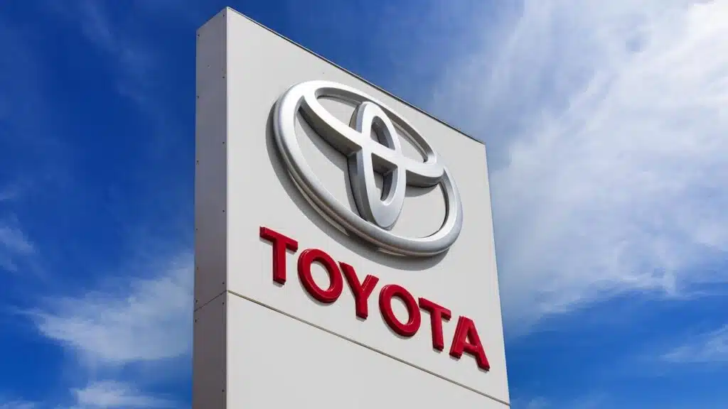 Toyota brand logo on dealer sign