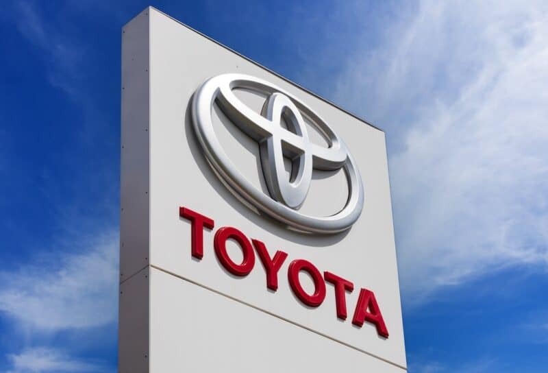 Toyota brand logo on dealer sign