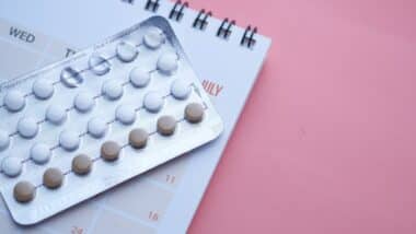 Concept for birth control with monthly calendar.