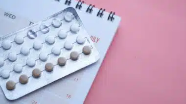 Concept for birth control with monthly calendar.