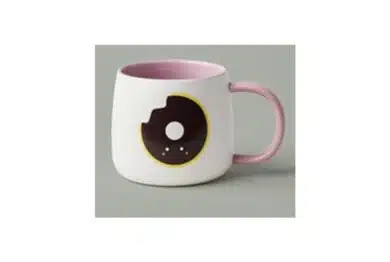 16oz white ceramic mug with a donut design on the front and back of the product.